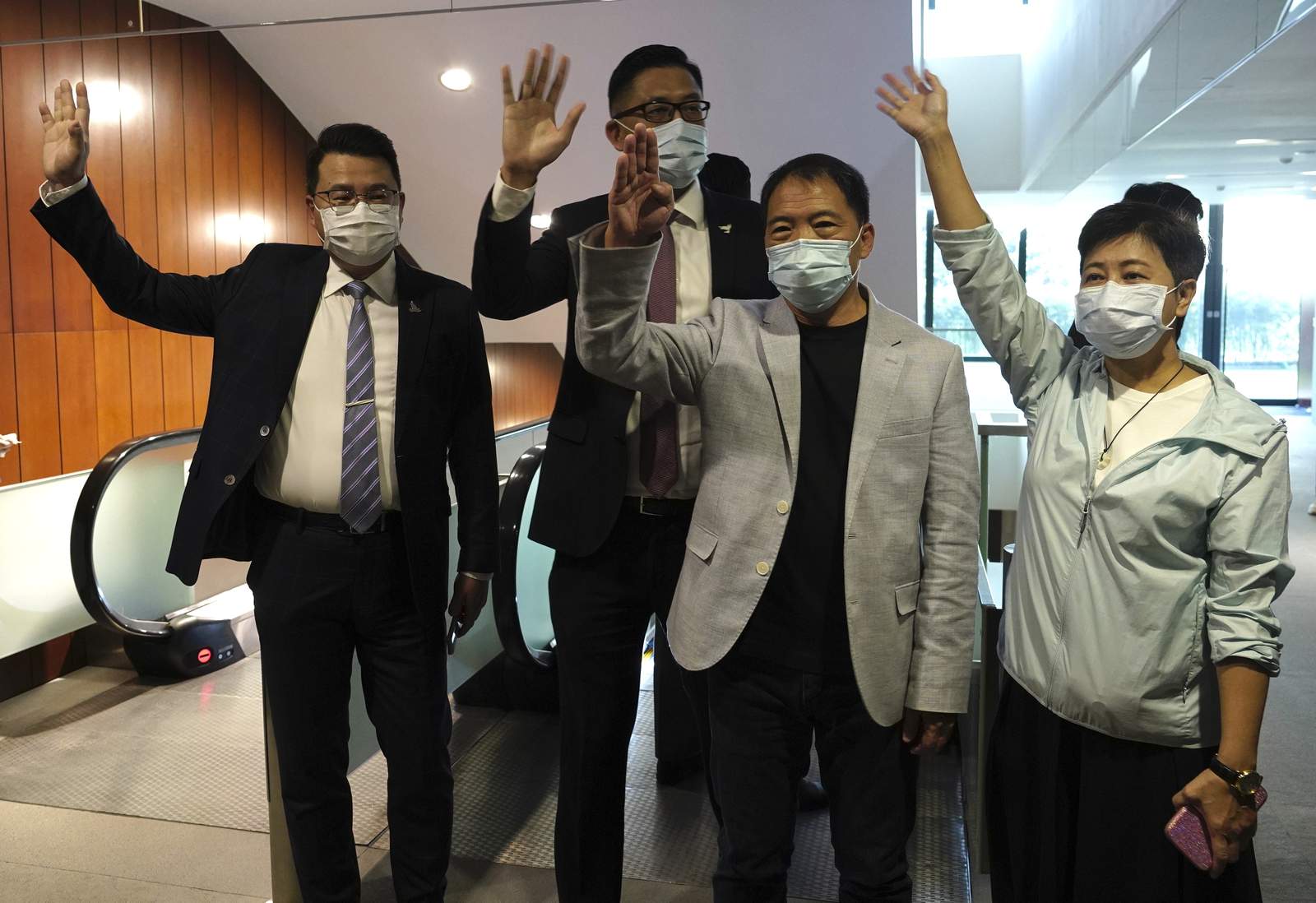 Hong Kong pro-democracy legislators hand in resignations