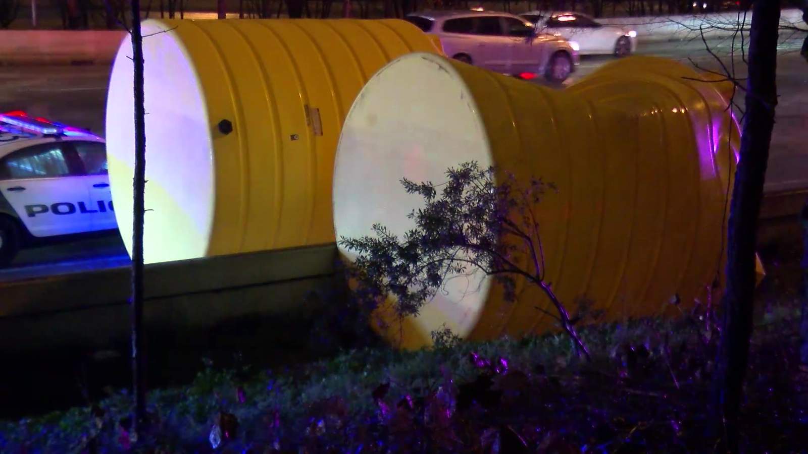 Drivers met with runaway 10-foot cylinders after truck hits bridge on Katy Freeway