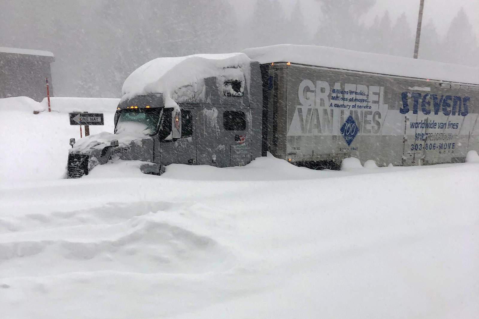 Atmospheric river storm drenches California, snow piles high