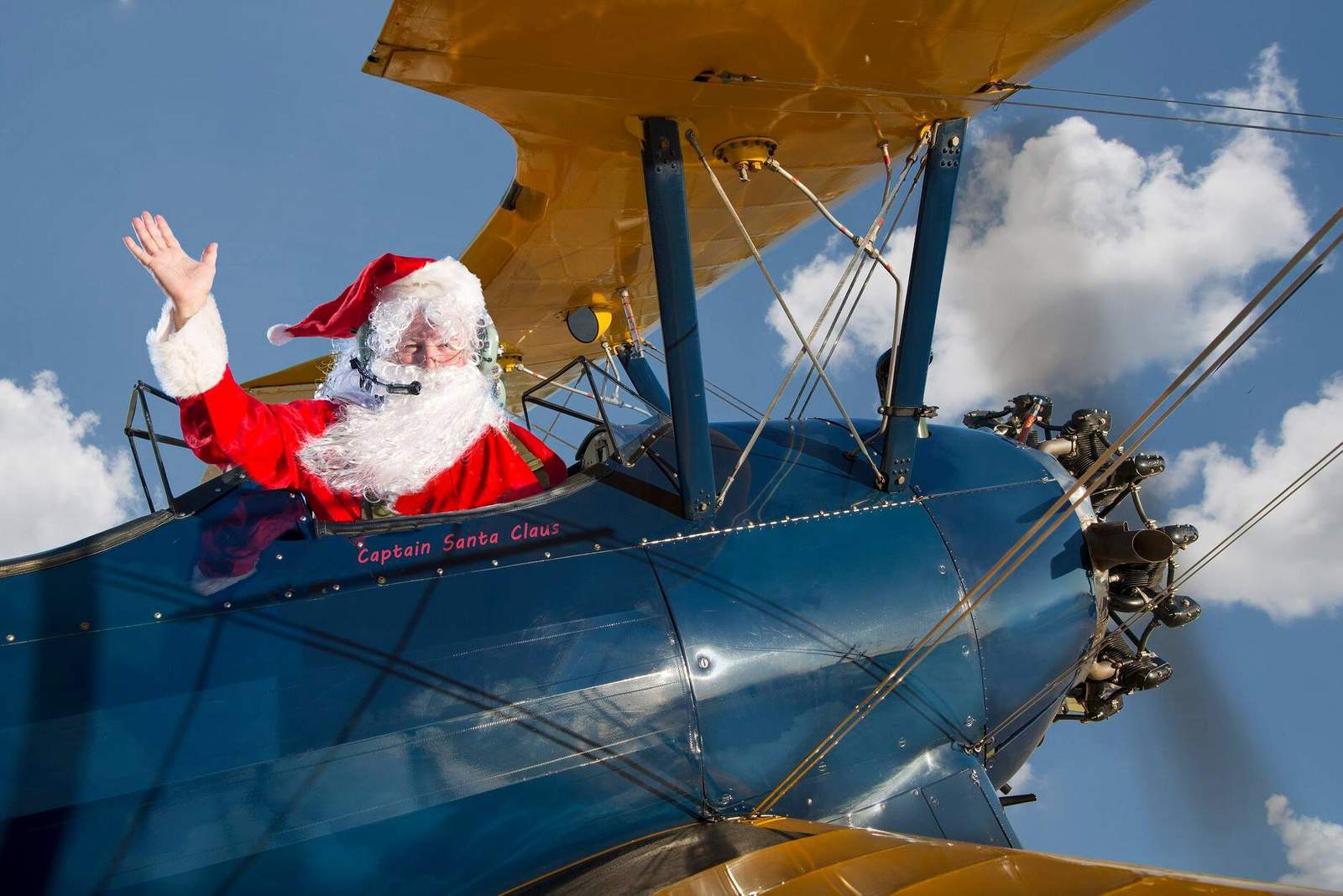 So much for a sleigh! Stearman Santa soars into Houston for festive photo-ops