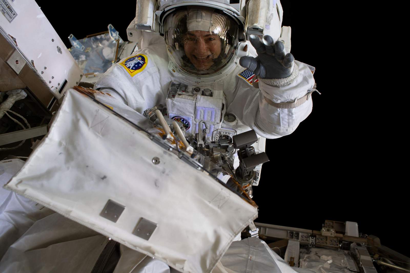 Second all-female spacewalk briefly hampered by helmet issue