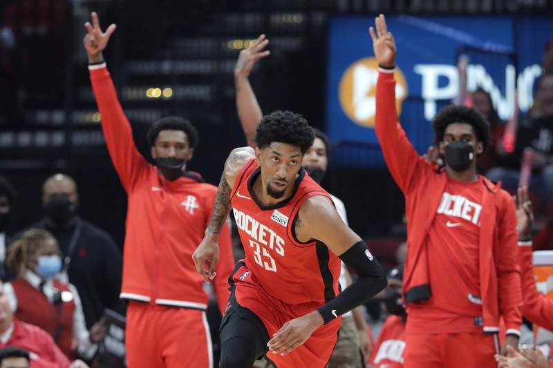 Wood helps Rockets rout Thunder 124-91 in home opener