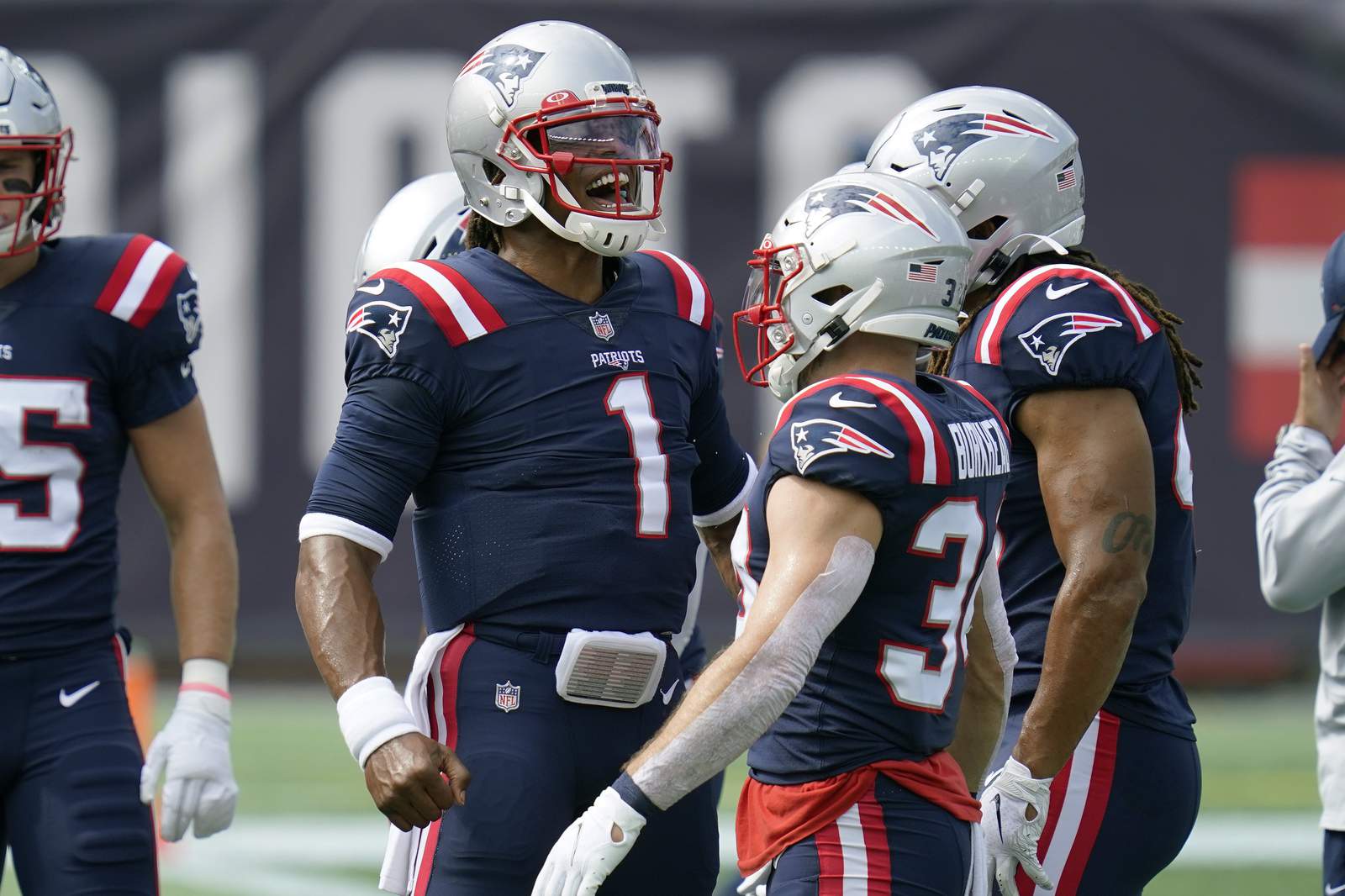 The Latest: Patriots' Newton 2nd on career QB rushing list