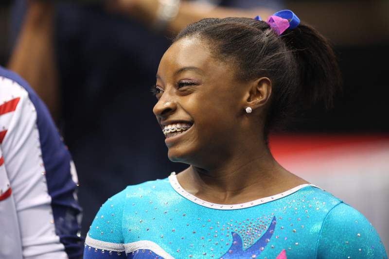 These photos show gymnastics superstar Simone Biles throughout her years in the spotlight