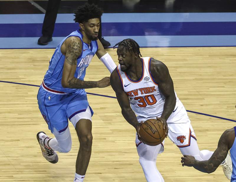 Randle scores 31 points as Knicks rout Rockets 122-97