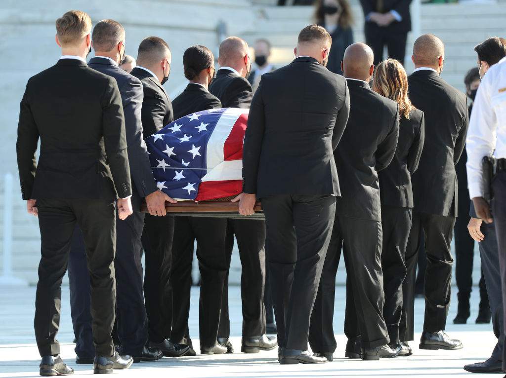 Justice Ruth Bader Ginsburg’s flag-draped casket arrives at Supreme Court