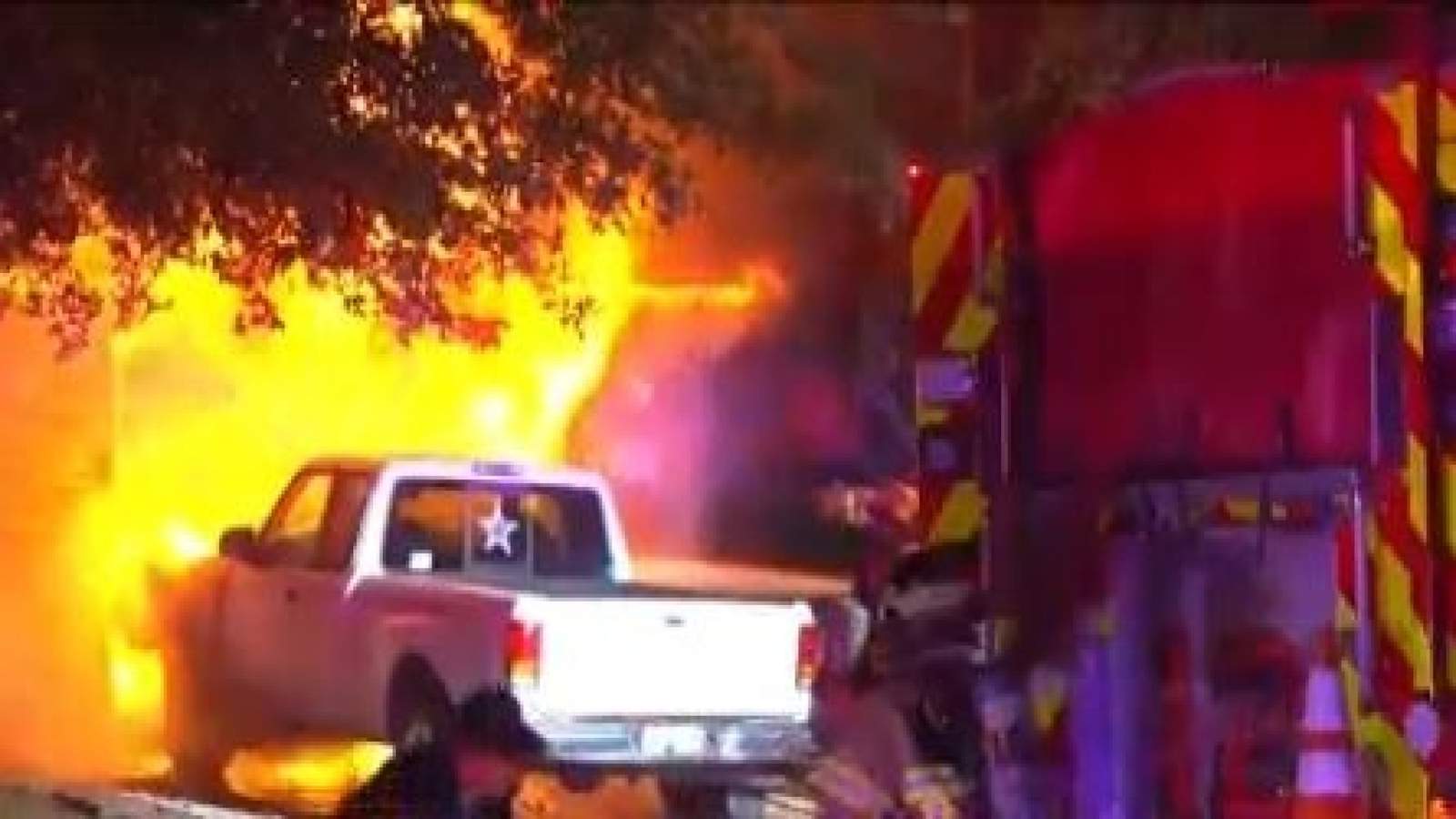 Family of 9 displaced after escaping large garage fire in Cypress
