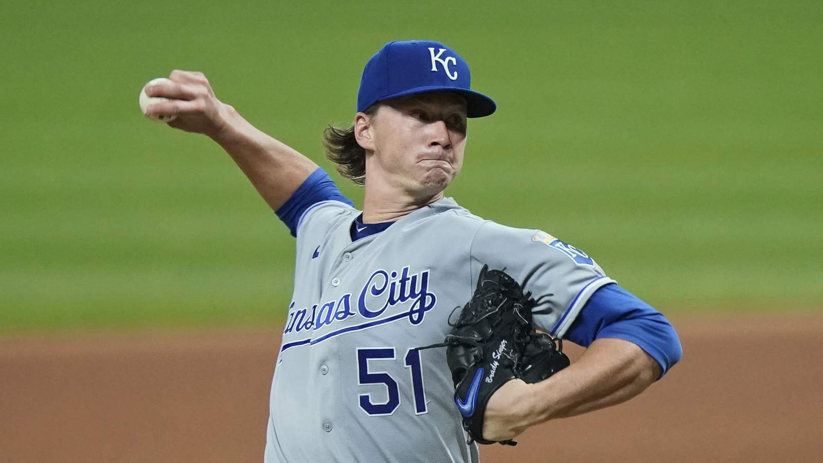 Singer flirts with no-hitter for 8, Royals beat Indians 11-1