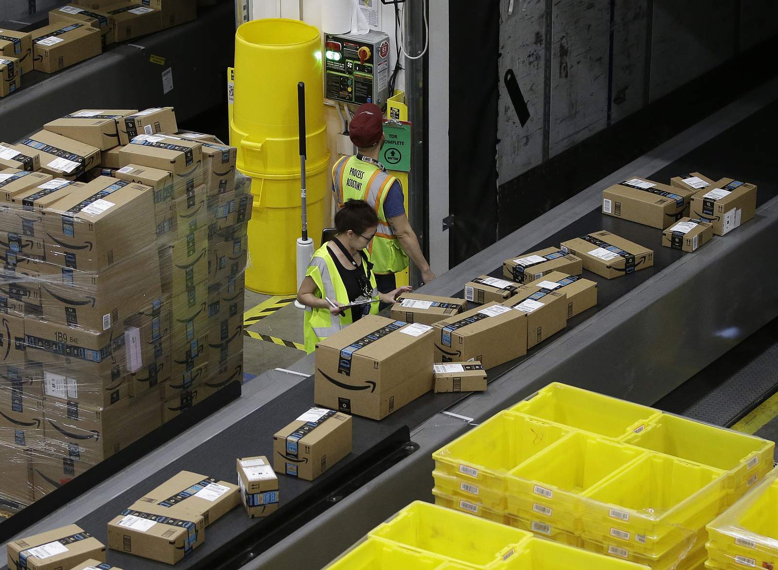 Amazon to hire 100,000 to keep up with online shopping surge