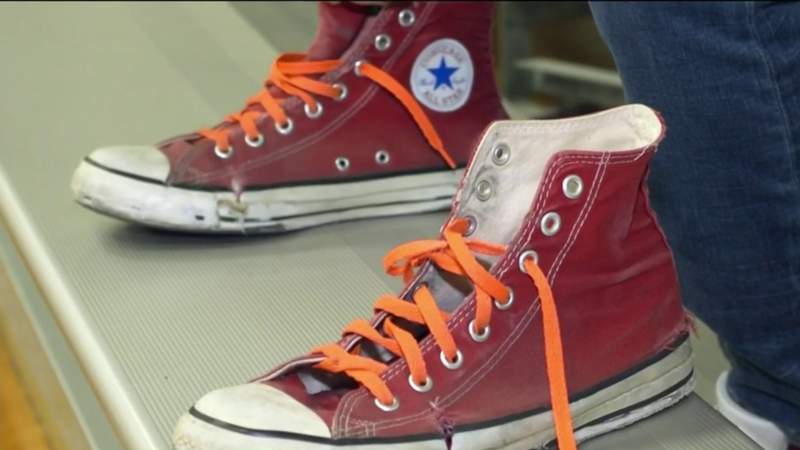 Alvin ISD’s Coach Robert Moore has been teaching for over 2 decades in the same red Converse shoes