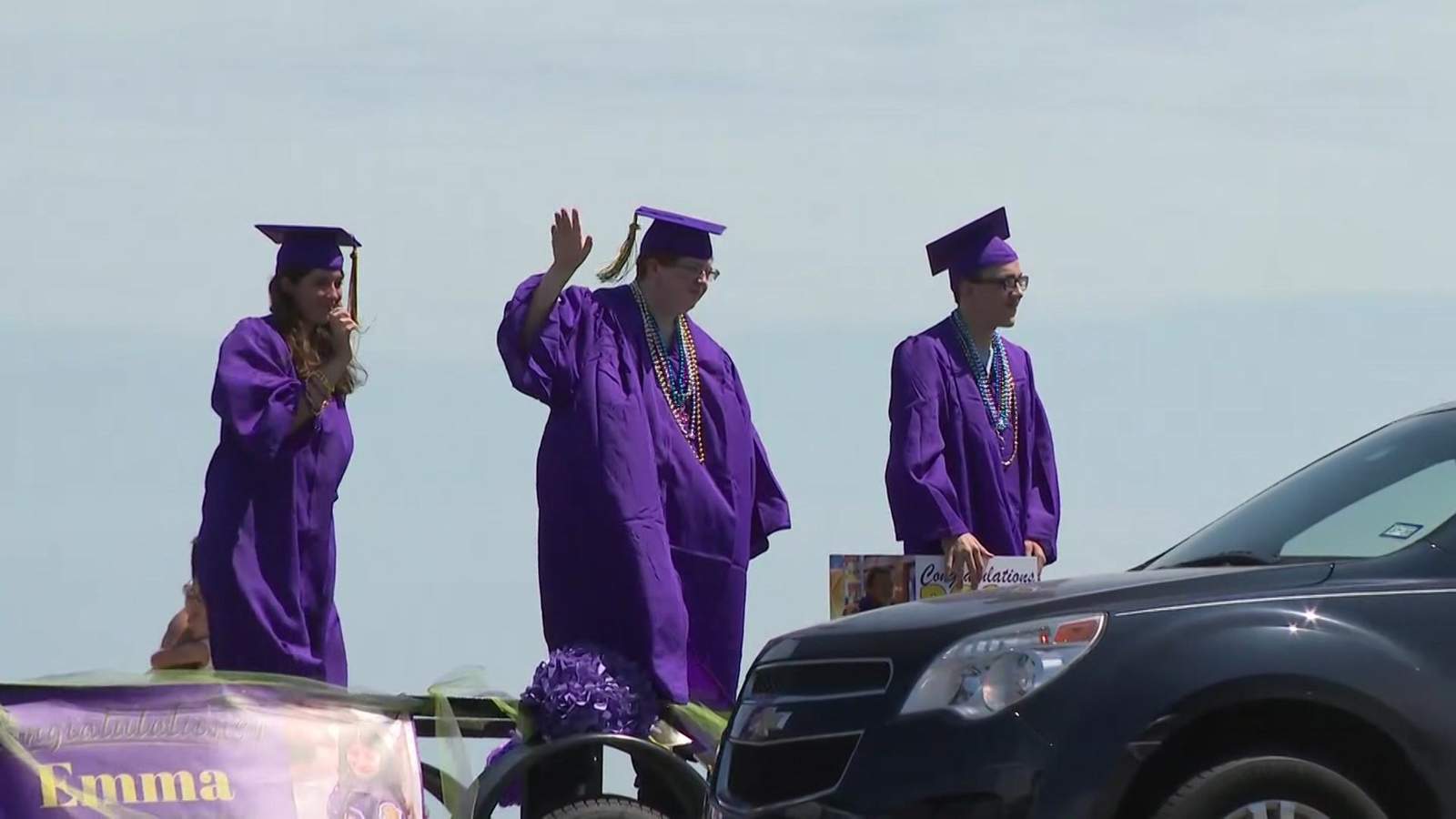 Galveston Ball High school seniors honored with parade while decked out in cap and gowns