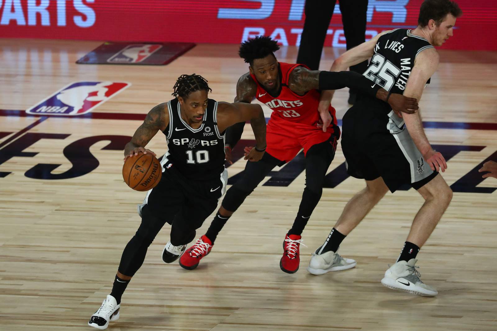 Sacramento Kings guard De'Aaron Fox (5) dribbles the ball during the second  half of an NBA basketball game against the Washington Wizards, Wednesday,  March 17, 2021, in Washington. The Kings won 121-119. (