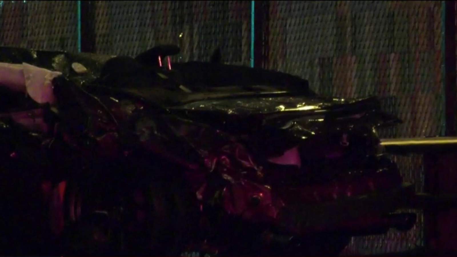 HPD: Passenger dead, driver injured after car flies off overpass, crashes into tree below