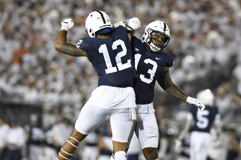 No. 10 Penn St holds on to white out No. 22 Auburn 28-20