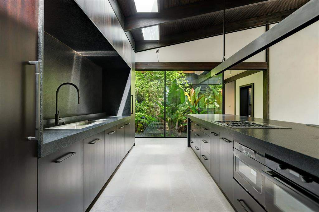 Newly-built sleek modern home in River Oaks with rainforest-like backyard seeking $6.9 million