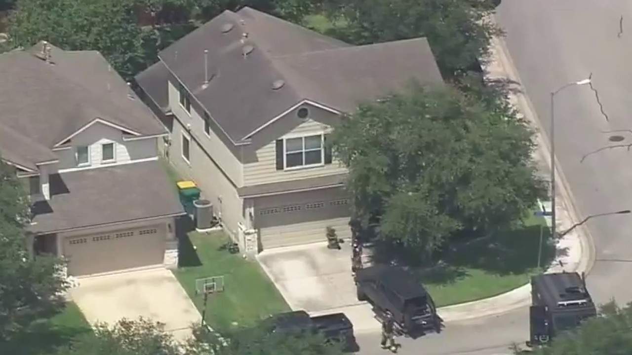 Family of 6 found dead in a SUV inside Texas home, police say