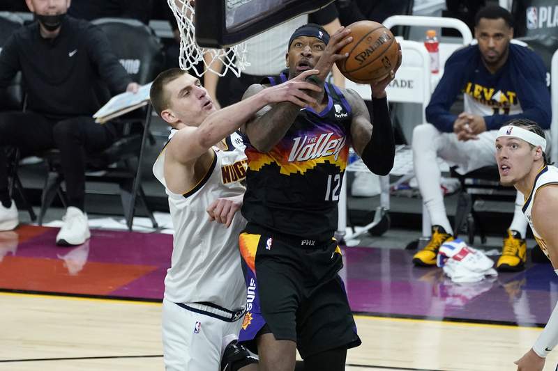 Rejuvenated Paul leads Suns over Nuggets 122-105 in Game 1