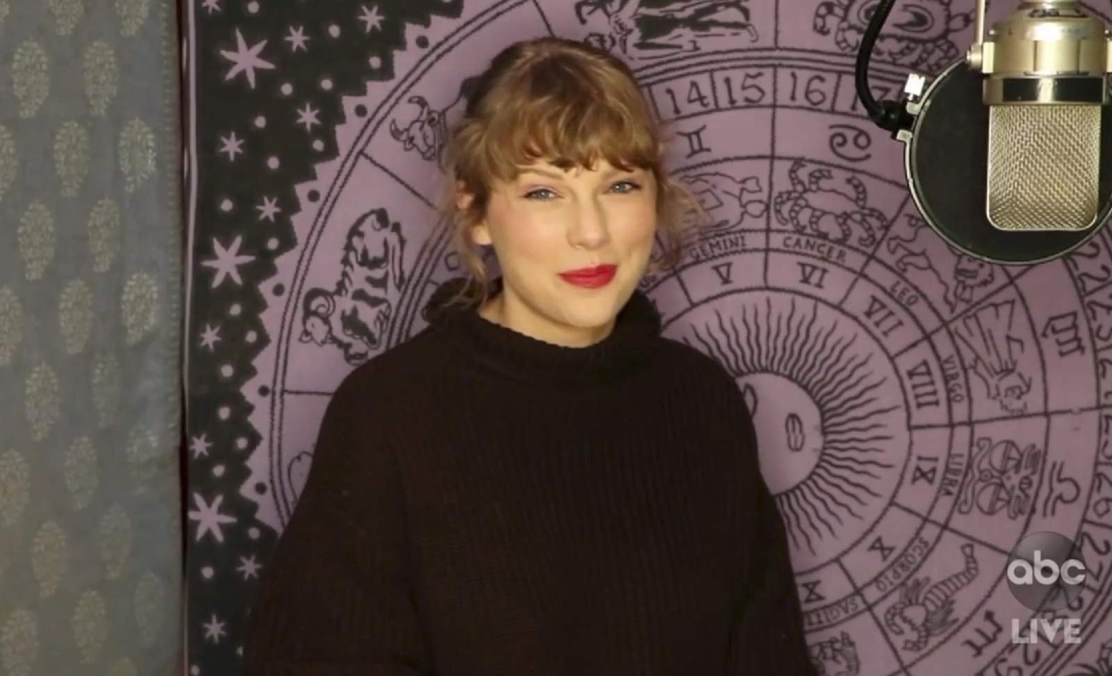 Swift wins top prize at AMAs, says she's re-recording music