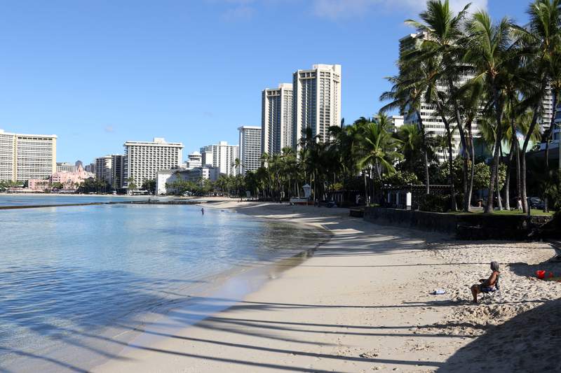 The Latest: Hawaii to drop rules for vaccinated travelers