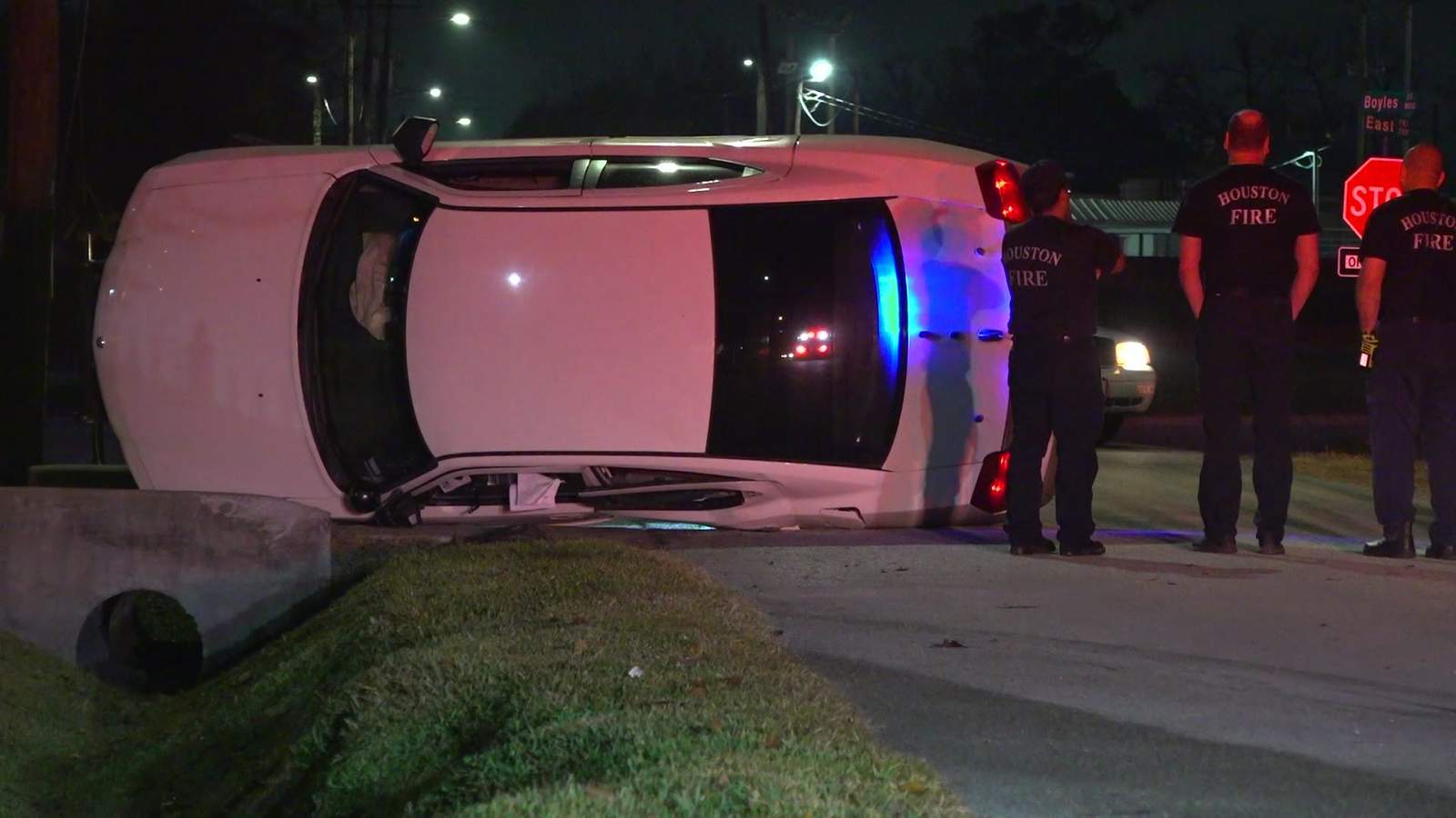 Houston police cruiser catches fire, flips during chase