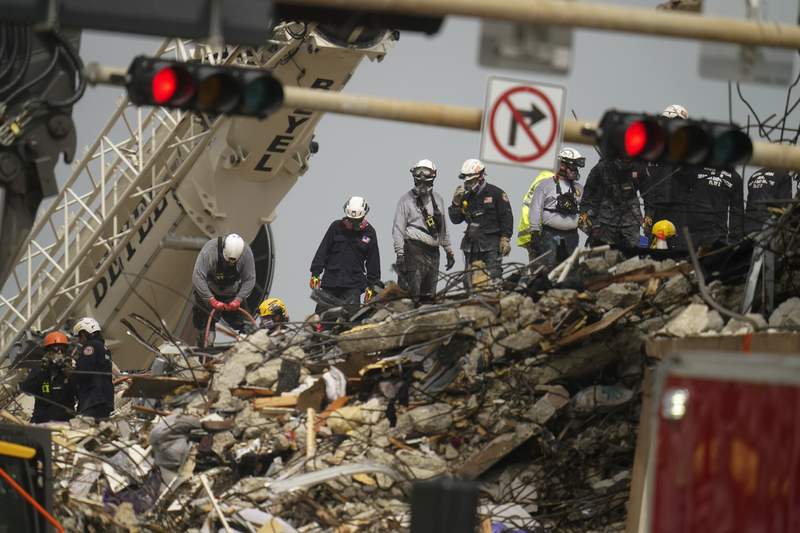 6 more bodies pulled from tower rubble in highest daily toll