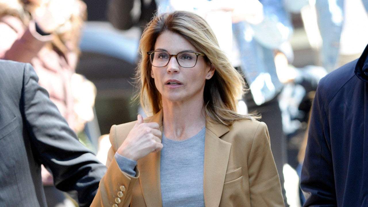 Actress Lori Loughlin reports to federal prison for role in college scam