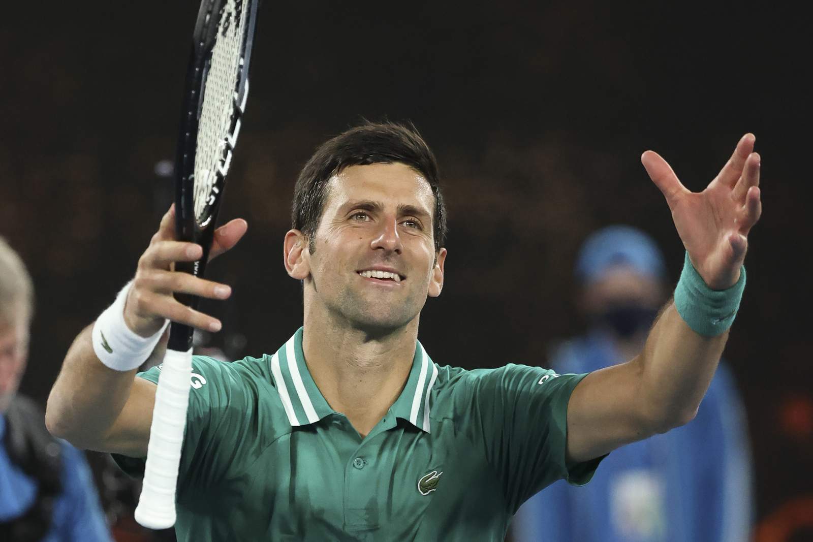Djokovic has routine win, but crowd is something different