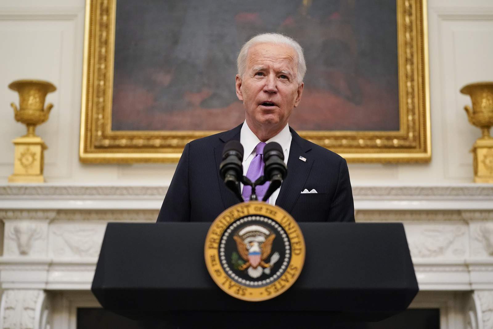 President Biden signs burst of virus orders, requires masks for travel