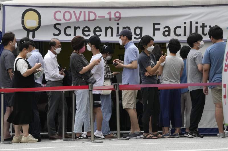Lockdowns in Asia as some nations see 1st major virus surges