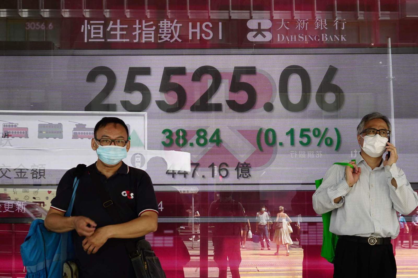 Asian shares lower as investors await Fed chair's speech