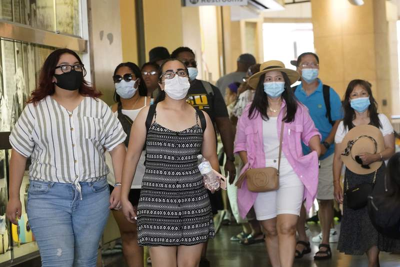 With virus cases rising, mask mandate back on in Los Angeles