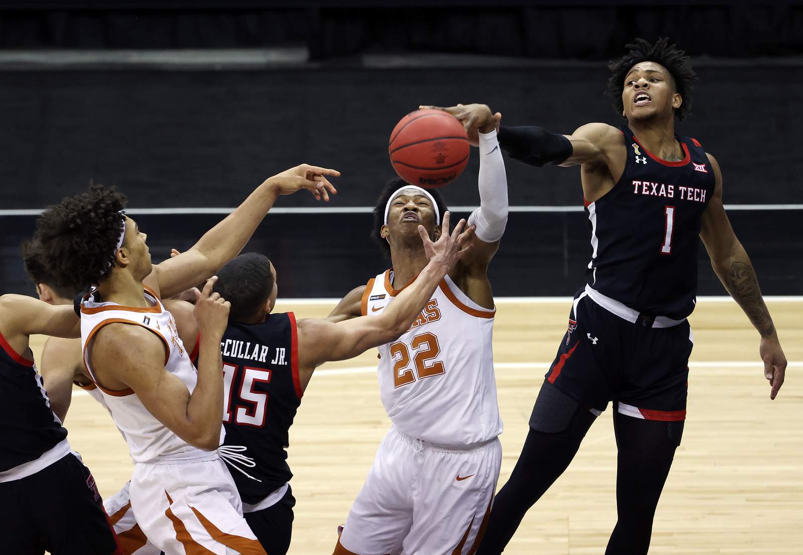 Texas advances to Big 12 title game with COVID-19 forcing Kansas out