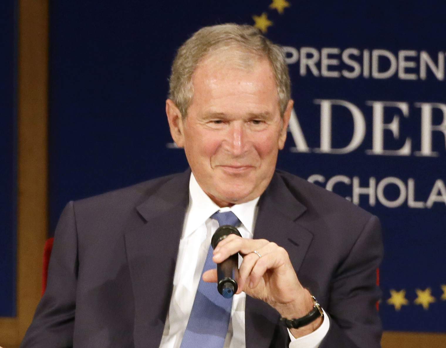 Former President Bush pays tribute to immigrants in new book
