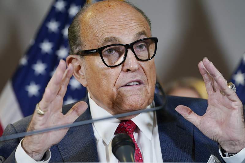 Federal investigators search Rudy Giuliani’s NYC home, office