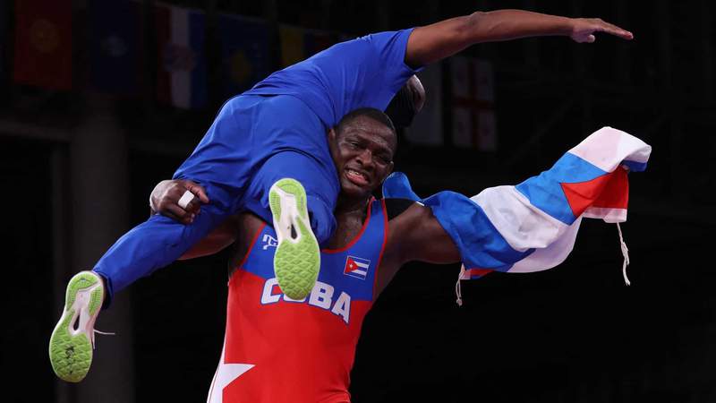 Cuban wrestler Mijain Lopez wins historic fourth wrestling gold