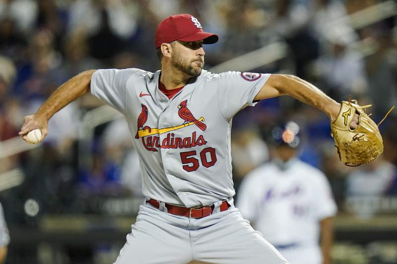 Wainwright wins 5th straight as Cards deck Mets 7-0