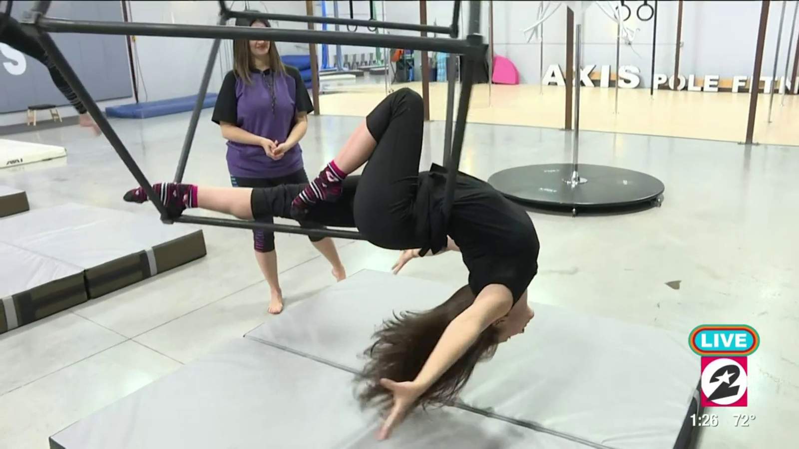 Learn cirque-inspired fitness moves at Axis Aerial Arts and Pole Fitness in Cypress
