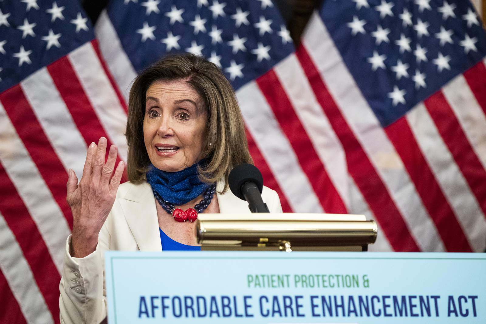 With a jab at Trump, Pelosi unveils new 'Obamacare' bill