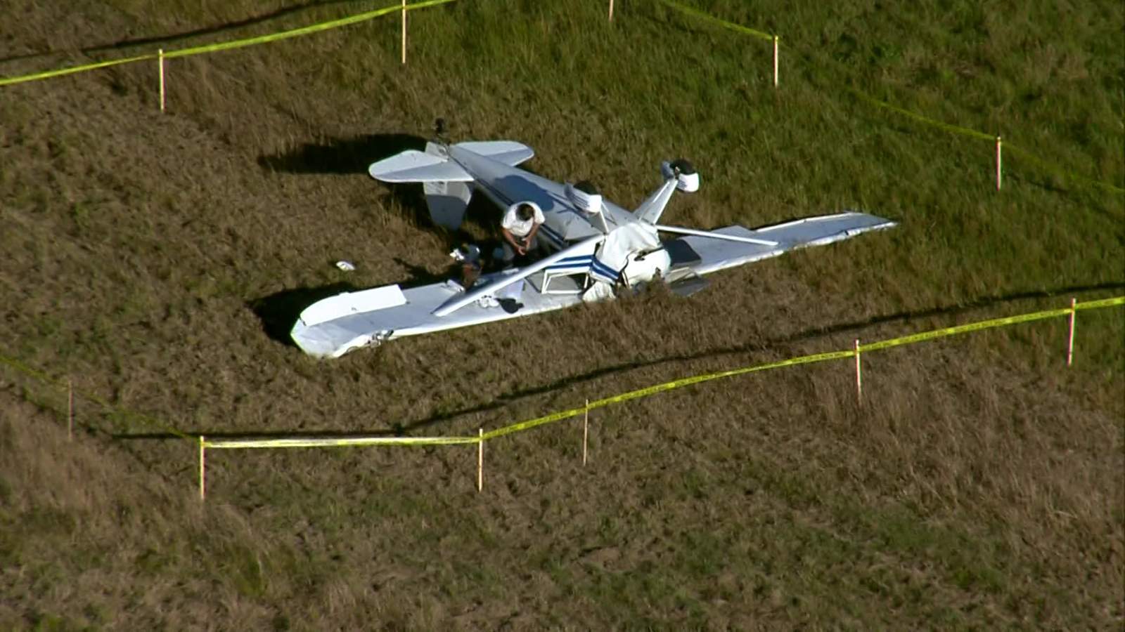 Pilot injured after single-engine plane hits power line, crashes near Manvel