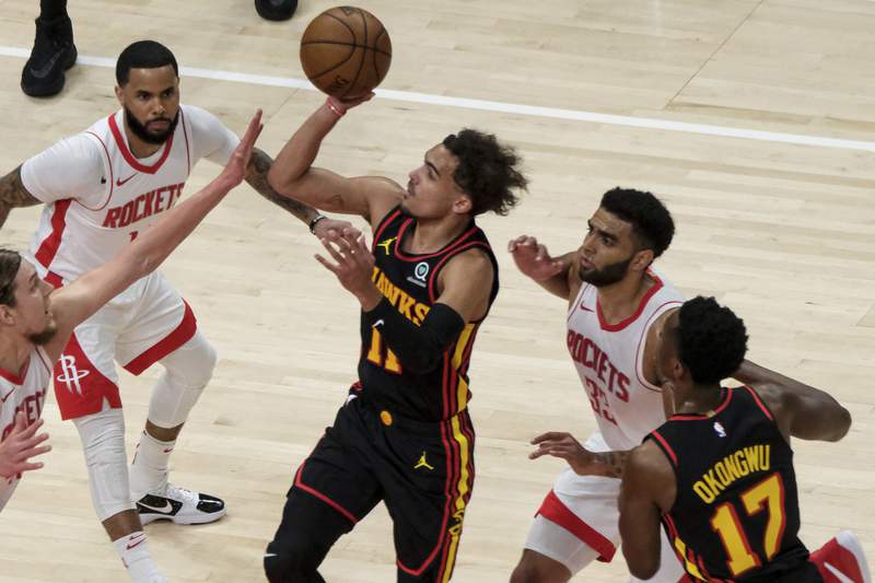 Hawks head to playoffs after 124-95 rout of woeful Rockets