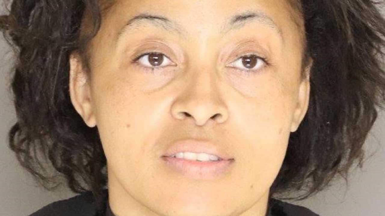 Woman charged after police say she licked hands, touched things in grocery store