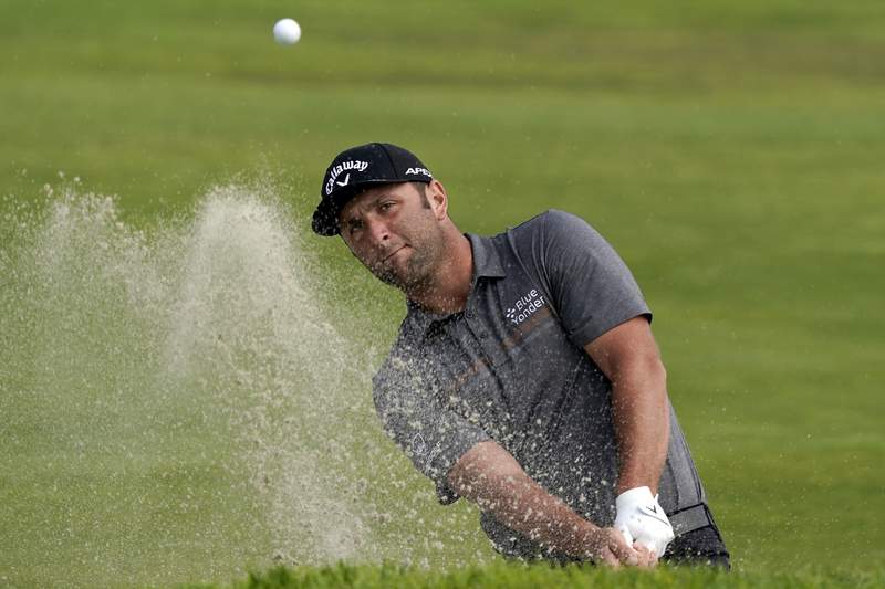 The Latest: Rahm in contention at U.S. Open on short prep