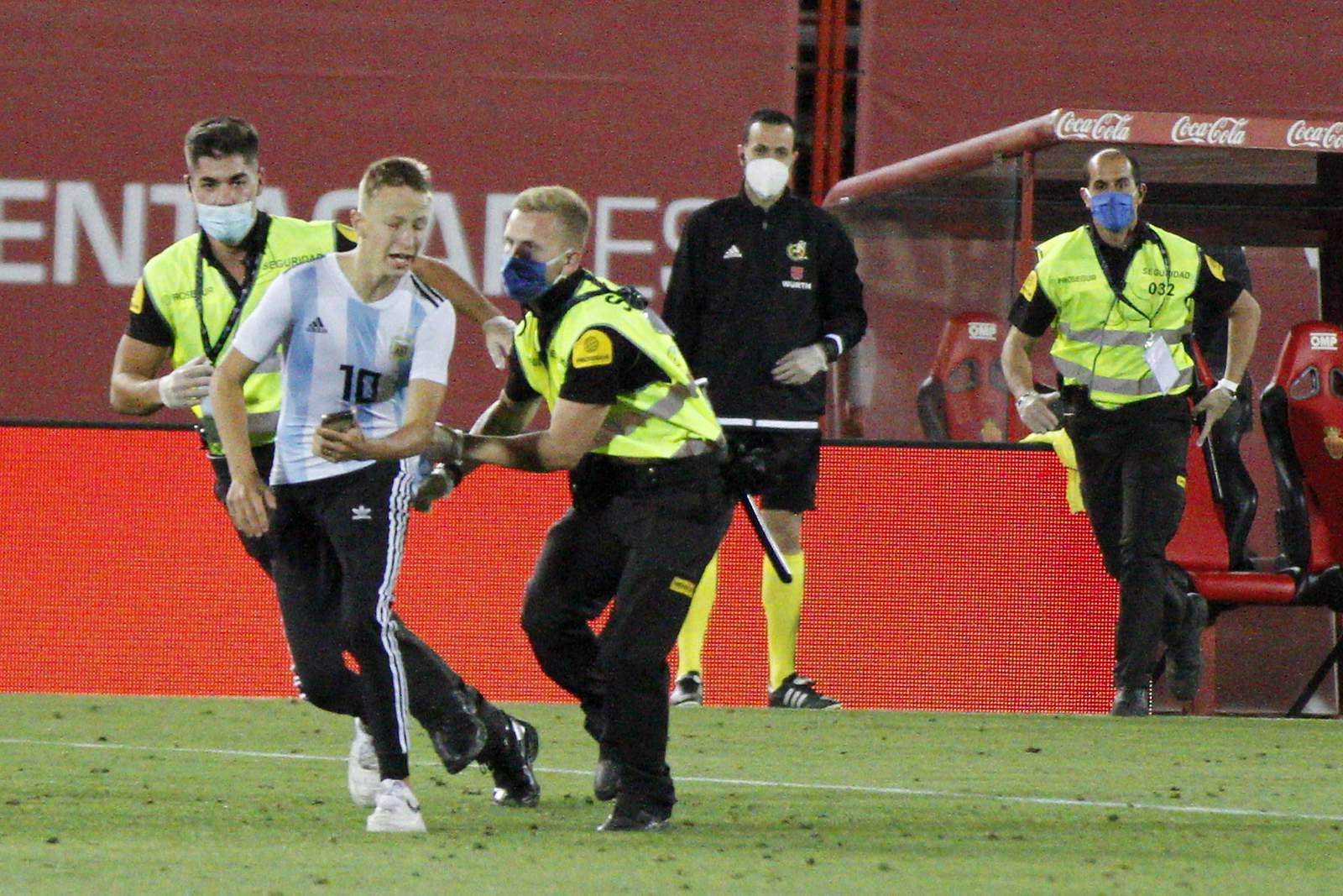 Spanish league to file charges against fan who invaded field