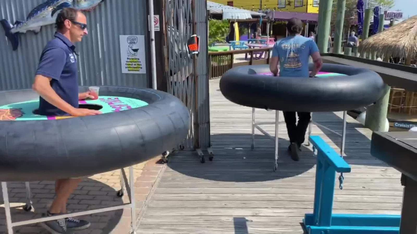 A restaurant’s new tables have huge inner tubes that make social distancing look fun