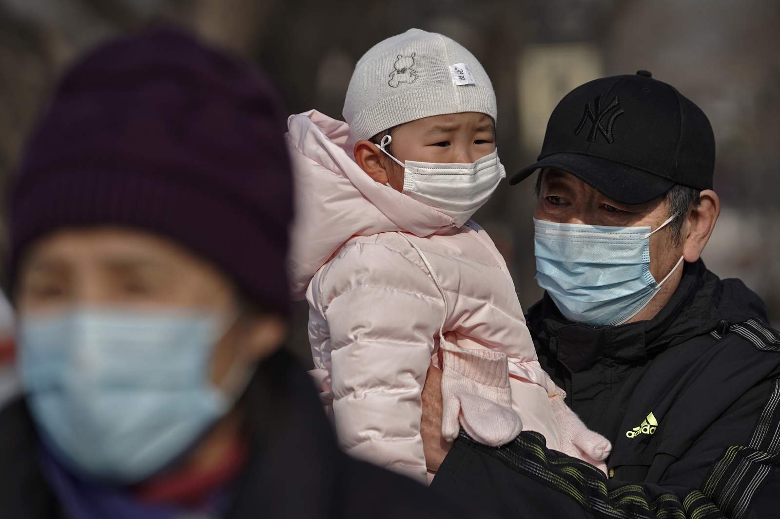 The Latest: Shanghai locks down 2 major hospitals over cases