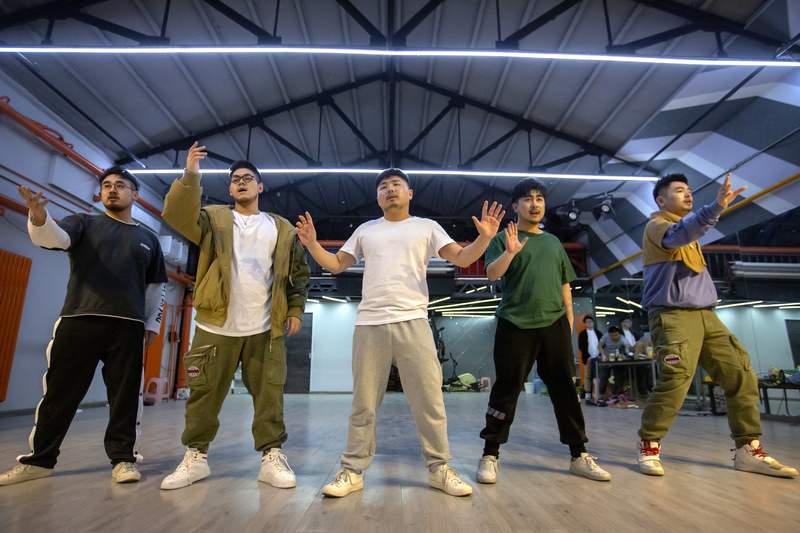 ‘Plus-size’ boy band in China seeks to inspire fans