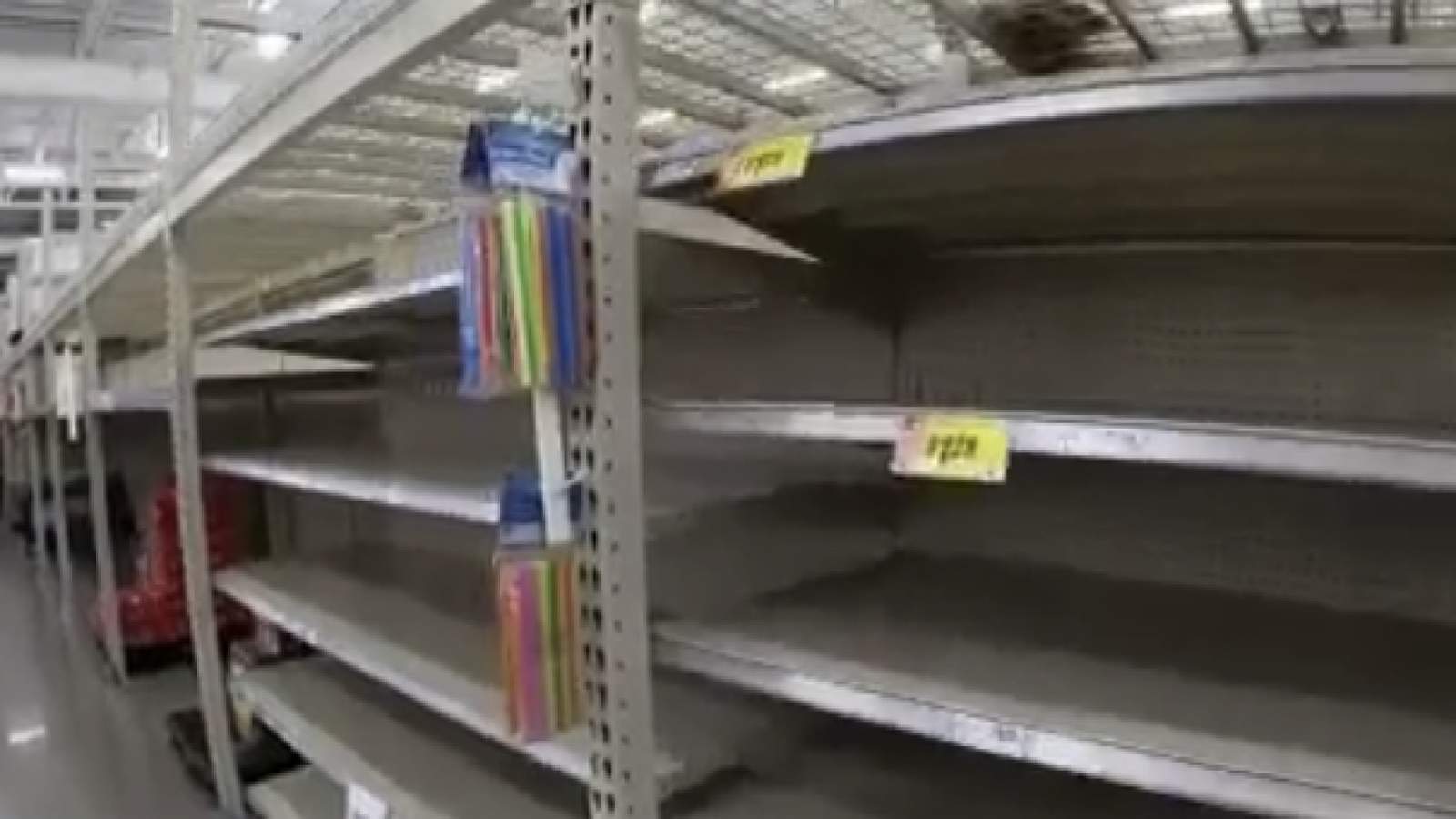Houstonians rush to grocery stores in search of bottled water but find mostly empty shelves