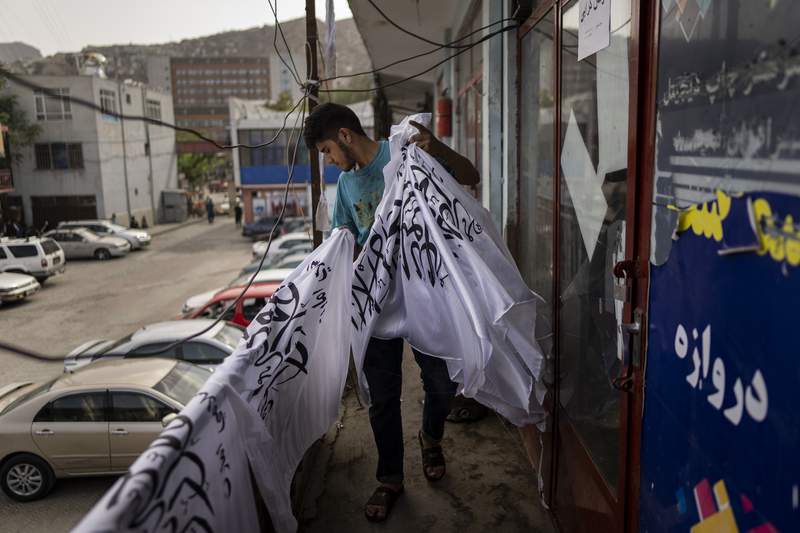 Kabul flag shop that started in Soviet era retools yet again