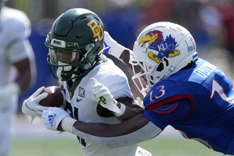 Baylor rides solid ground game to 45-7 victory over Kansas