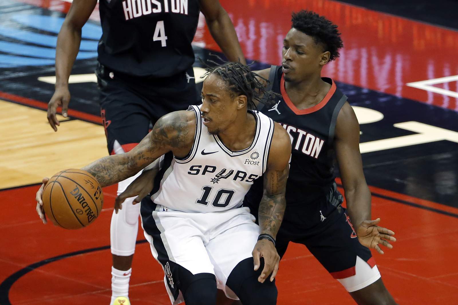 DeRozan has 30 as Spurs hold on for 111-106 win over Rockets